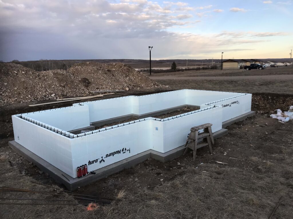 Completed insulated concrete form foundation for a residential project by Alberta Builder Services.