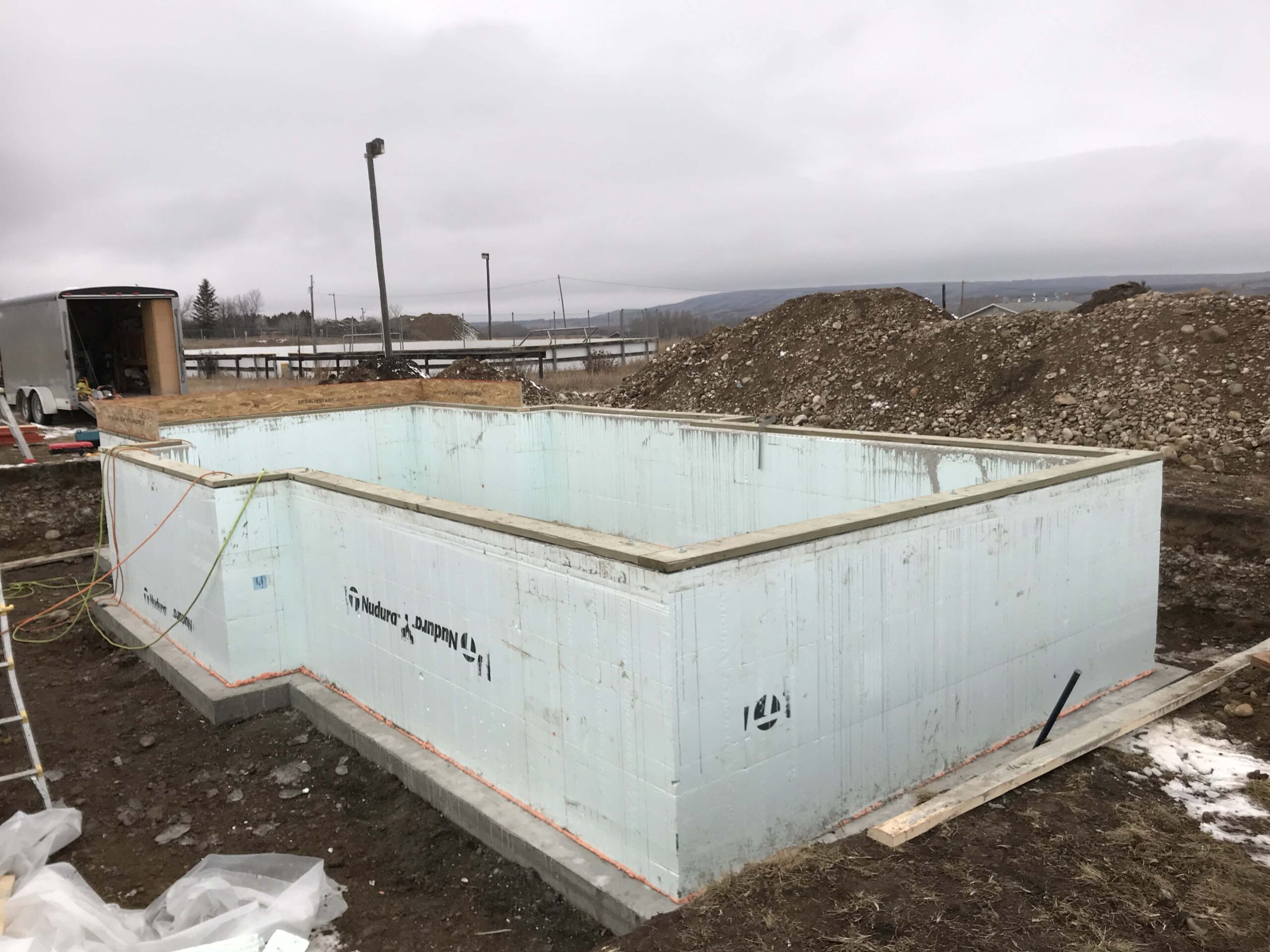 Alberta Builder Services completing an insulated concrete foundation for a strong and energy-efficient start.