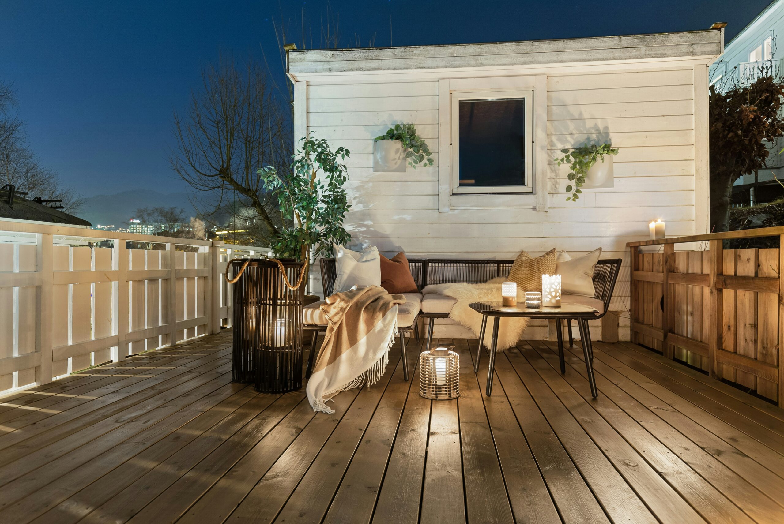 A custom-built wooden deck attached to a modern home.